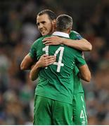 7 September 2015; Republic of Ireland's John O'Shea and Jon Walters congratulate each other after their side's victory. UEFA EURO 2016 Championship Qualifier, Group D, Republic of Ireland v Georgia, Aviva Stadium, Lansdowne Road, Dublin. Picture credit: Seb Daly / SPORTSFILE
