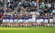 17 March 2009; The Kilmacud Crokes players stand for the National Anthem before the game. All-Ireland Senior Club Football Championship Final, Crossmaglen Rangers v Kilmacud Crokes. Croke Park, Dublin. Picture credit: Daire Brennan / SPORTSFILE