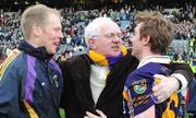 17 March 2009; Former Kilmacud Crokes chairman Pauric McMenamin congratulates players Liam McBarron, left, and Paul Griffin after the game. All-Ireland Senior Club Football Championship Final, Crossmaglen Rangers v Kilmacud Crokes. Croke Park, Dublin. Picture credit: Daire Brennan / SPORTSFILE