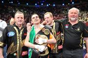 21 March 2009; Bernard Dunne celebrates with, from left, trainer Harry Hawkins, promoter Brian Peters, and sponsor Martin Donnelly, after victory over Ricardo Cordoba to win the WBA World Super Bantamweight title. Hunky Dory World Title Fight Night, Bernard Dunne v Ricardo Cordoba, The O2, Dublin. Picture credit: David Maher / SPORTSFILE