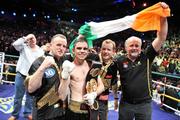21 March 2009; Bernard Dunne celebrates with, from left, trainer Harry Hawkins, promoter Brian Peters, and sponsor Martin Donnelly after victory over Ricardo Cordoba to win the WBA World Super Bantamweight title. Hunky Dory World Title Fight Night, Bernard Dunne v Ricardo Cordoba, The O2, Dublin. Picture credit: David Maher / SPORTSFILE