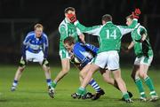21 March 2009; Kevin Meaney, Laois, in action against James Sherry, left, Ryan Carson, 14, and Enda Ferris, Fermanagh. Allianz GAA National Football League, Division 2, Round 5, Laois v Fermanagh, O'Moore Park, Portlaoise, Co. Laois. Picture credit: Pat Murphy / SPORTSFILE