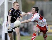 22 March 2009; Adrian Faherty, Galway, in action against Paul Young, Derry. Allianz GAA National Football League, Division 1, Round 5, Derry v Galway, Glen Pitch, Maghera, Co. Derry. Picture credit: Oliver McVeigh / SPORTSFILE *** Local Caption ***