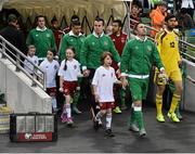 7 September 2015; Robbie Keane, Republic of Ireland captain leads the team out for the start of the game against Georgia. UEFA EURO 2016 Championship Qualifier, Group D, Republic of Ireland v Georgia, Aviva Stadium, Lansdowne Road, Dublin. Picture credit: David Maher / SPORTSFILE