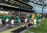 7 September 2015; Robbie Keane, Republic of Ireland captain, leads the team out for the start of the game against Georgia. UEFA EURO 2016 Championship Qualifier, Group D, Republic of Ireland v Georgia, Aviva Stadium, Lansdowne Road, Dublin. Picture credit: David Maher / SPORTSFILE