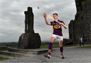 9 September 2015; Wexford captain Eoin Conroy was in Cashel today to mark this weekend’s Bord Gáis Energy GAA Hurling U-21 All-Ireland Championship Final. This is the final time the Cross of Cashel trophy will be awarded to the winning team, meaning Wexford or Limerick will be the last side to have the honour of lifting the iconic trophy. All the action from this game will be live on TG4 at 7pm on Saturday 12th September and fans can vote for their player of the match by using #LaochBGE. The Rock of Cashel, Cashel, Co. Tipperary. Picture credit: Ramsey Cardy / SPORTSFILE