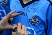 9 September 2015; A Dublin supporter has his jersey signed at the Dublin Senior Football Open Night. Parnell Park, Dublin. Picture credit: Piaras Ó Mídheach / SPORTSFILE