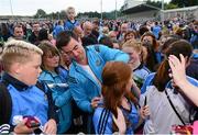 9 September 2015; Dublin footballer Michael Darragh MacAuley signs autographs for supporters during the Dublin Senior Football Open Night. Parnell Park, Dublin. Picture credit: Piaras Ó Mídheach / SPORTSFILE