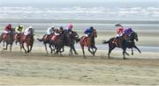 10 September 2015; A general view of The O'Neills Sports Handicap as eventual winner Strait of Zanzibar, right, with Pauline Condon up, races alongside Swiss Cross, with Katie Walsh up, who finished third. Laytown Races, Laytown, Co. Meath. Picture credit: Cody Glenn / SPORTSFILE
