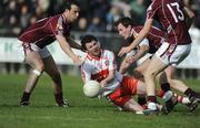 22 March 2009; Paul Young, Derry, in action against Joe Bergin and Diarmaid Blake, Galway. Allianz GAA National Football League, Division 1, Round 5, Derry v Galway, Glen Pitch, Maghera, Co. Derry. Picture credit: Oliver McVeigh / SPORTSFILE *** Local Caption ***