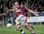 22 March 2009; Paul Conroy, Galway, scores his side's first goal as Kevin McCloy, Derry, tries to get in a tackle. Allianz GAA National Football League, Division 1, Round 5, Derry v Galway, Glen Pitch, Maghera, Co. Derry. Picture credit: Oliver McVeigh / SPORTSFILE *** Local Caption ***