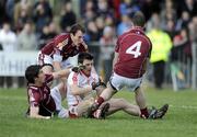 22 March 2009; Eoin Bradley, Derry, in action against Diarmaid Blake, Finian Hanley and Damien Burke, Galway. Allianz GAA National Football League, Division 1, Round 5, Derry v Galway, Glen Pitch, Maghera, Co. Derry. Picture credit: Oliver McVeigh / SPORTSFILE *** Local Caption ***