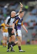 17 March 2009; Kevin Nolan, Kilmacud Crokes, is shown a yellow card by referee Gearoid O Conamha. AIB All-Ireland Senior Club Football Championship Final, Crossmaglen Rangers, Co. Armagh, v Kilmacud Crokes, Dublin. Croke Park, Dublin. Picture credit: Ray McManus / SPORTSFILE