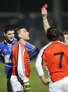 14 February 2009; Brendan Quigley, Laois, and Peadar Toal, Armagh, receive red cards from referee Pat Fox. Allianz GAA NFL Division 2 Round 2, Armagh v Laois. Athletic Grounds, Armagh. Picture credit: Oliver McVeigh / SPORTSFILE