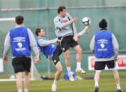24 March 2009; Republic of Ireland's Darron Gibson, right,   in action against his team-mate Kevin Kilbane during squad training ahead of their 2010 FIFA World Cup Qualifier against Bulgaria on Saturday. Gannon Park, Malahide, Co. Dublin. Picture credit: David Maher / SPORTSFILE