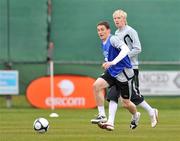 24 March 2009; Republic of Ireland's Keith Andrews in action against his team-mate Andy Keogh during squad training ahead of their 2010 FIFA World Cup Qualifier against Bulgaria on Saturday. Gannon Park, Malahide, Co. Dublin. Picture credit: David Maher / SPORTSFILE