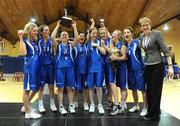 25 March 2009; The Our Lady and Saint Patricks team and coach Anne Wynne celebrate with the trophy. Malahide Community School, Dublin v Our Lady and Saint Patricks, Belfast, Co. Antrim - U19B Girls - Schools League Finals, National Basketball Arena, Tallaght, Dublin. Picture credit: Stephen McCarthy / SPORTSFILE