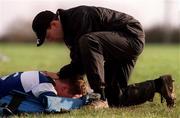 4 December 2000; Brian O'Driscoll receives treatment during training from team physio Ailbe McCormack at the ALLSA Sportsgrounds in Dublin Airport, Dublin. Photo by Aoife Rice/Sportsfile