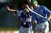 26 November 2000; Eddie O'Dwyer of Graigue Ballycallan is blocked by Fionan O'Sullivan of Castletown during the AIB Leinster Senior Hurling Championship Final between Graigue Ballycallan and University College Dublin at Nowlan Park in Kilkenny. Photo by Ray McManus/Sportsfile