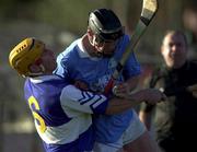 26 November 2000; John Hoyne of Graigue Ballycallan is tackled by Cyril Cuddy of Castletown during the AIB Leinster Senior Hurling Championship Final between Graigue Ballycallan and University College Dublin at Nowlan Park in Kilkenny. Photo by Ray McManus/Sportsfile