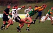 12 November 2000; Nigel Clancy of Sligo clears the ball despite the efforts of Nigel Crawford of Meath during the Allianz National Football League Division 1B match betweeen Meath and Sligo at Pairc Tailteann, Navan in Meath. Photo by Damien Eagers/Sportsfile
