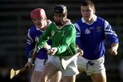 12 November 2000; DJ Carey of Leinster races clear of Frank Lohan, left, and Diarmuid O'Sullivan of Munster during the Railway Cup hurling Final match between Leinster and Munster at Nowlan Park in Kilkenny. Photo by Ray McManus/Sportsfile
