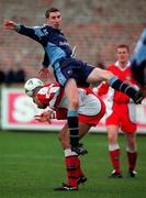 12 November 2000; Eoin Bennis of UCD in action against Paul Osam of St Patricks Athletic during the Eircom League Premier Division match between St Patricks Athletic and University College Dublin at Belfield in Dublin. Photo by Pat Murphy/Sportsfile