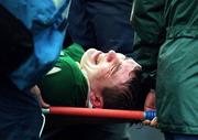 12 November 2000; Offaly's Ciaran McManus winces in pain after he is stretchered off after receiving an injury during the Church & General National Football League Division 1A match between Offaly and Dublin at O'Connor Park in Tullamore, Offaly. Photo by Aoife Rice/Sportsfile
