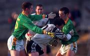 12 November 2000; Dessie Sloyane of Sligo is tackled by Stephen Bray, left, and Paul Shankey of Meath during the Allianz National Football League Division 1B match betweeen Meath and Sligo at Pairc Tailteann, Navan in Meath. Photo by Damien Eagers/Sportsfile