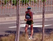 29 September 2000; Jamie Costin of Ireland competing in the mens 50k walk during the Sydney Olympics at Stadium Australia in Sydney. Photo by Brendan Moran/Sportsfile