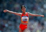 23 September 2000; China's Liping Wang, celebrates winning gold in womens 20k walk at Stadium Australia, Sydney Olympic Park, Homebush Bay, Sydney, Australia. Photo by Brendan Moran/Sportsfile