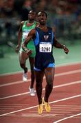 25 September 2000; Michael Johnson of USA competing in the mens 400m during the Sydney Olympics at Sydney Olympic Park in Sydney, Australia. Photo by Brendan Moran/Sportsfile