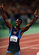 25 September 2000; Michael Johnson of USA celebrates after winning gold in the mens 400m during the Sydney Olympics at Sydney Olympic Park in Sydney, Australia. Photo by Brendan Moran/Sportsfile