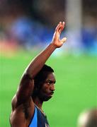 25 September 2000; Michael Johnson of USA celebrates after winning gold in the mens 400m during the Sydney Olympics at Sydney Olympic Park in Sydney, Australia. Photo by Brendan Moran/Sportsfile