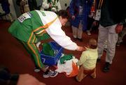 25 September 2000; Sonia O'Sullivan of Ireland with her daughter Ciara following the womens 10,000 final during the Sydney Olympics at Sydney Olympic Park in Sydney, Australia. Photo by Brendan Moran/Sportsfile