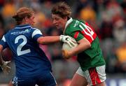1 October 2000; Cora Staunton of Mayo in action against Marion Troy of Waterford during the TG4 All-Ireland Senior Ladies Football Championship Final between Mayo and Waterford at Croke Park in Dublin. Photo by Ray Lohan/Sportsfile