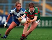 1 October 2000; Cora Staunton of Mayo in action against Marion Troy of Waterford during the TG4 All-Ireland Senior Ladies Football Championship Final between Mayo and Waterford at Croke Park in Dublin. Photo by Ray Lohan/Sportsfile