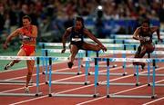 25 September 2000; Gail Devers of USA, centre competing in the womens 110m hurdles during the Sydney Olympics at Sydney Olympic Park in Sydney, Australia. Photo by Brendan Moran/Sportsfile