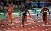 25 September 2000; Gail Devers of USA, centre, competing in the womens 110m hurdles during the Sydney Olympics at Sydney Olympic Park in Sydney, Australia. Photo by Brendan Moran/Sportsfile