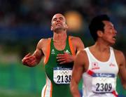 25 September 2000; Tom McGurk of Ireland after finishing the mens 400m hurdles during the Sydney Olympics at Sydney Olympic Park in Sydney, Australia. Photo by Brendan Moran/Sportsfile