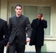 13 November 2000; Republic of Ireland Soccer players Mark Kennedy, left, and Phil Babb leaving the Dublin District Court after their case had been adjourned for lunch. Photo by Ray Lohan/Sportsfile