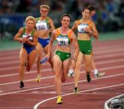 29 September 2000; Ciara Sheehy of Ireland competing in the womens 4x400m relay during the Sydney Olympics at Stadium Australia in Sydney. Photo by Brendan Moran/Sportsfile