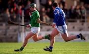 12 November 2000;  Henry Sheeflin of Leinster races clear of John Carroll of Munster during the Railway Cup hurling Final match between Leinster and Munster at Nowlan Park in Kilkenny. Photo by Ray McManus/Sportsfile