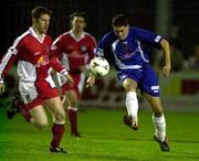 17 November 2000; Gary Beckett of St Patricks Athletic in action against Robert Griffin of UCD during the Eircom league Premier Division match between St Patricks Athletic and Derry City at Inchicore in Dublin. Photo by David Maher/Sportsfile