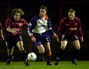 17 November 2000; Aidan Lynch of UCD in action against Kevin Hunt, left, and Anthony Hopper of Bohemians during the Eircom League Premier Division match between Bohemians and UCD at Dalymount Park in Dublin. Photo by David Maher/Sportsfile