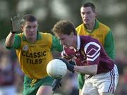 19 November 2000; James Nallen of Crossmolina under pressure from Michael Donnellan, left and Aidan Donnellan of Corofin during the AIB Connacht Club Football Championship Final between Crossmolina and Corofin at St Tiernan's Park, Crossmolina in Mayo. Photo by Ray McManus/Sportsfile