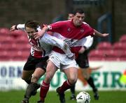 25 November 2000; Greg O'Halloran of Cork City is tackled by Kevin Hunt of Bohemians during the Eircom League Premier Division match between Cork City and Bohemians at Turners Cross in Cork. Photo by David Maher/Sportsfile