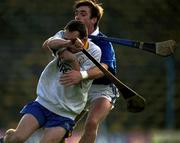 26 November 2000; Sixmilebridge goalkeeper David Fitzgerald is tackled by Tony Browne of Mount Sion during the AIB Munster Club Hurling Championship Final match between Sixmilebridge and Mount Sion at Semple Stadium in Thurles, Tipperary. Photo by Brendan Moran/Sportsfile