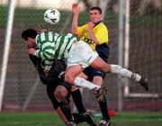 26 November 2000; Brian Byrne of Shamrock Rovers in action against Finn Harps goalkeeper Gareth Downey, and Johnny Kenny during the eircom League Premier Division match between Shamrock Rovers and Finn Harps at Morton Stadium in Dublin. Photo by David Maher/Sportsfile