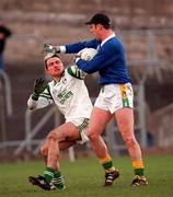26 November 2000; Fermanagh's Stephen Maguire is tackled by Meath goalkeeper Cormac Sullivan, following this incident Cormac Sullivan received a yellow card and Fermanagh awarded a penalty during the Allianz National Football League Division 1B match between Meath and Fermanagh at Pairc Tailteann in Navan. Photo by Aoife Rice/Sportsfile